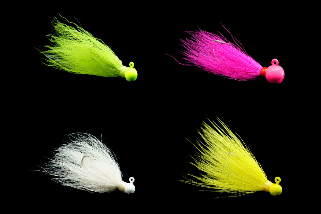 collection of pompano jigs in assorted colors, bucktail jigs, gulfstream lures, saltwater jigs, ladyfish jigs, tarpon jigs, casting jigs, best pompano jigs