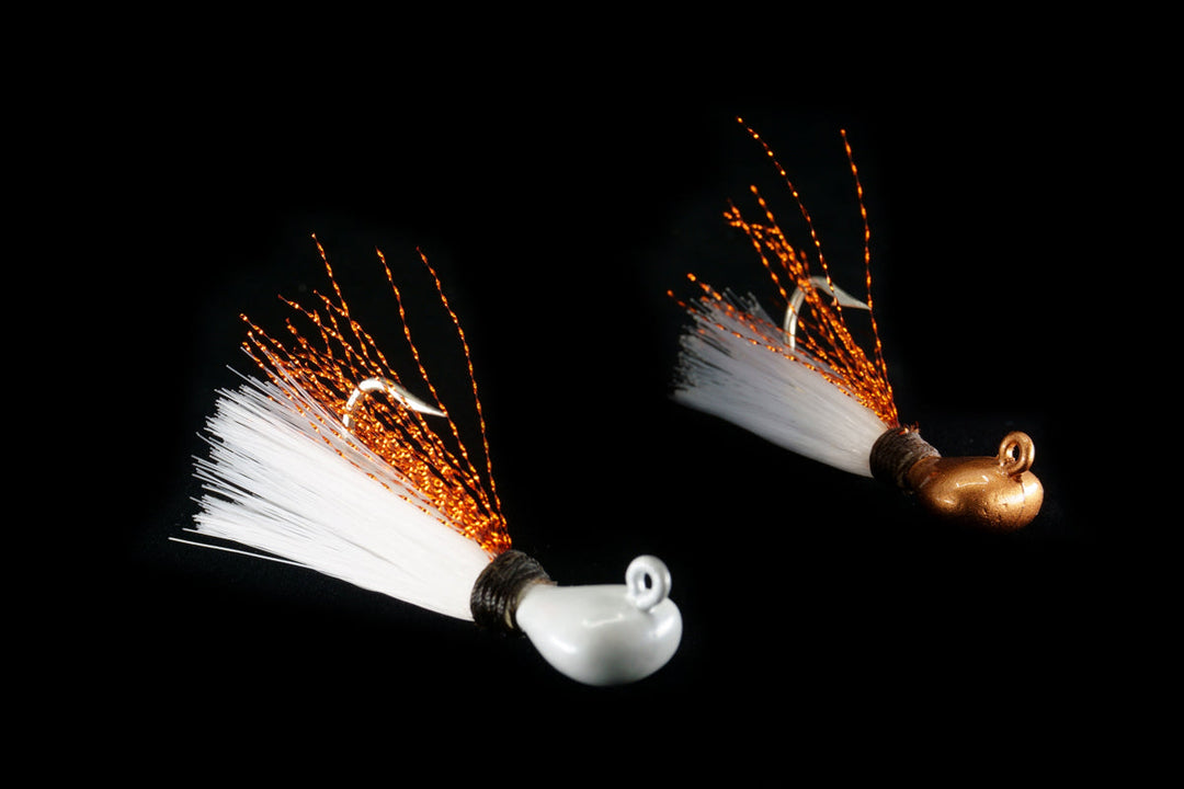 Redfish Jig with white head and white body, Redfish jig with gold head and white body, gulfstream lures, these are saltwater jigs and saltwater lures.  They are also used as pompano jigs, pompano lures, snook jigs, snook lures, sea trout jigs, seatrout lures, bonefish jigs, bonefish lures, snapper jigs, snapper lures, permit jigs and permit lures