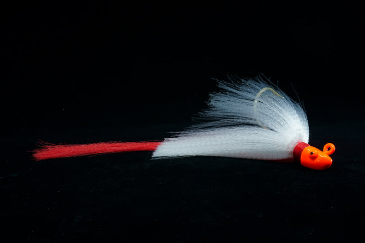 Snook Slayer with Orange Head, White Body and Red Tail. This Gulfstream Lures jig is great as a Snook Jig, Snook Lure, Tarpon Jig, Tarpon Lure, Cobia Jig, Cobia Lure, Striped Bass Jig, Striped Bass lure. Saltwater lures, Saltwater jigs.